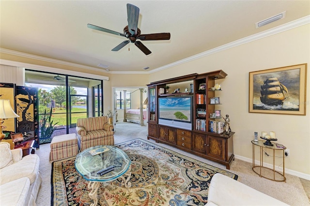 19889 Benissimo Dr, Venice, FL 34293 - living room with a ceiling fan, carpet floors, crown molding, and visible vents