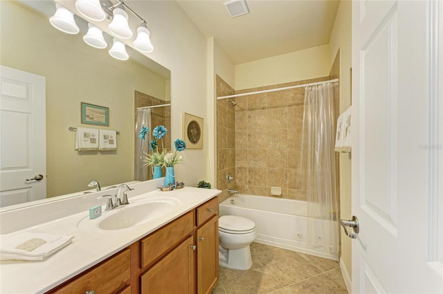 19889 Benissimo Dr, Venice, FL 34293 - bathroom featuring tile patterned flooring, vanity, shower / tub combo with curtain, toilet, and visible vents