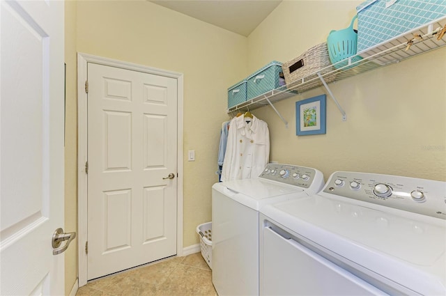 19889 Benissimo Dr, Venice, FL 34293 - laundry area with independent washer and dryer, laundry area, baseboards, and light tile patterned floors