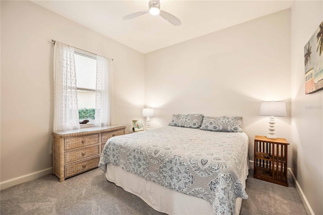 bedroom featuring carpet floors, a ceiling fan, and baseboards