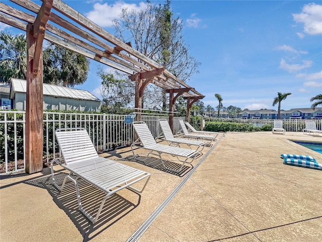 4850 51st St W Unit 4205, Bradenton, FL 34210 - view of patio / terrace featuring a community pool, a pergola, and fence