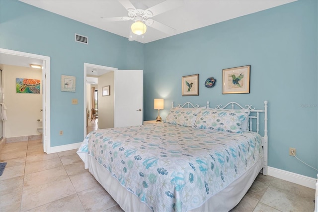 bedroom featuring visible vents, a ceiling fan, baseboards, and tile patterned floors