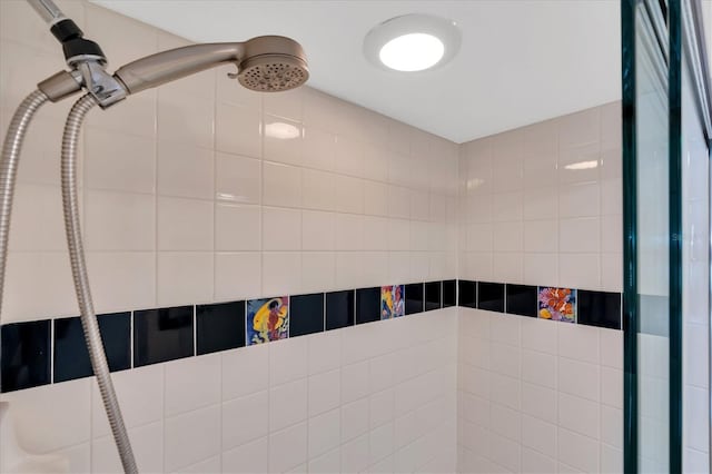 details with a tile shower