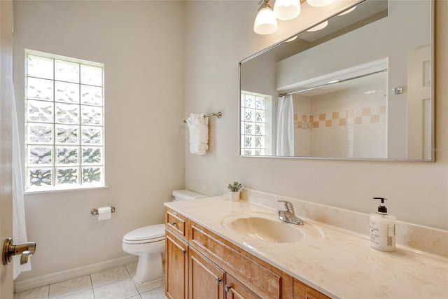 bathroom featuring baseboards, curtained shower, toilet, vanity, and tile patterned flooring
