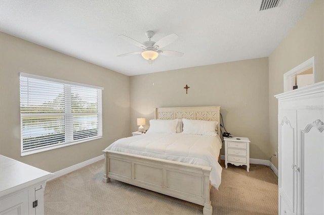 2628 Sapphire Blue Ln, Bradenton, FL 34211 - bedroom featuring light colored carpet, baseboards, and ceiling fan