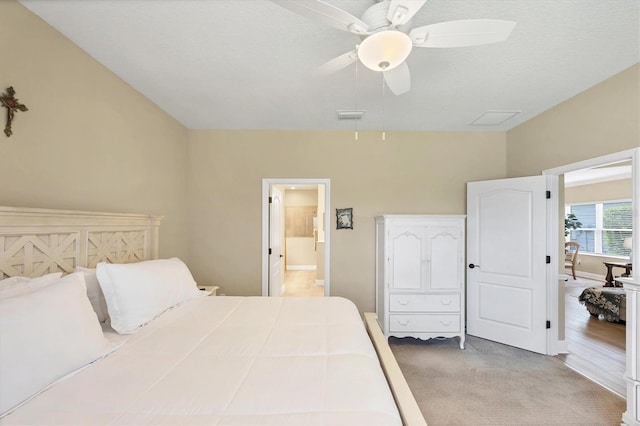 2628 Sapphire Blue Ln, Bradenton, FL 34211 - bedroom featuring carpet floors, connected bathroom, and ceiling fan