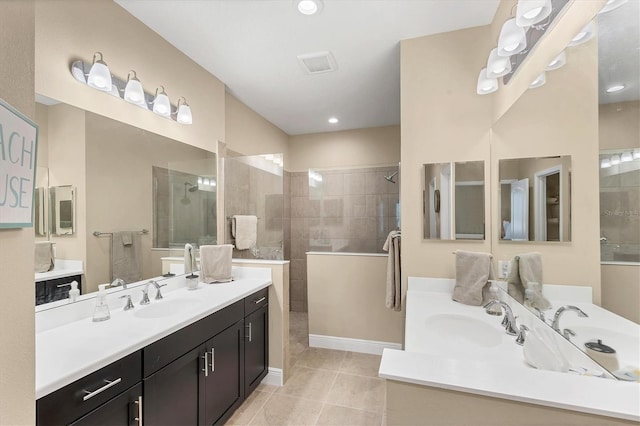 2628 Sapphire Blue Ln, Bradenton, FL 34211 - full bathroom with tile patterned floors, a walk in shower, and two vanities