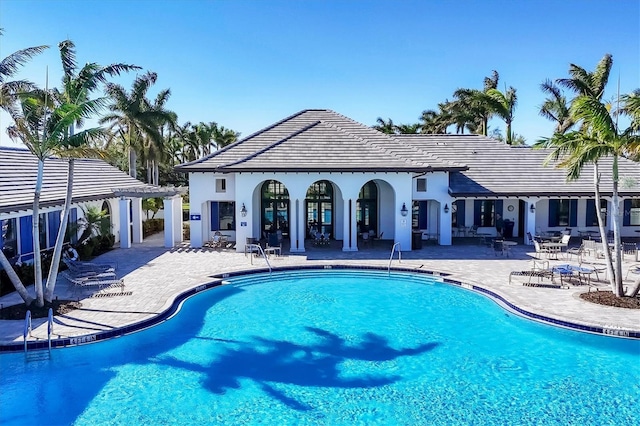 2628 Sapphire Blue Ln, Bradenton, FL 34211 - community pool featuring a pergola and a patio area