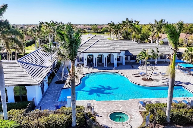 2628 Sapphire Blue Ln, Bradenton, FL 34211 - community pool with a hot tub and a patio