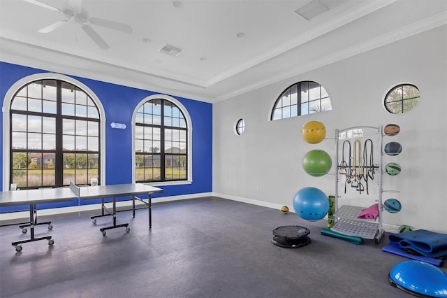 2628 Sapphire Blue Ln, Bradenton, FL 34211 - workout room featuring baseboards, a raised ceiling, ceiling fan, and crown molding