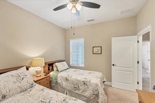 2628 Sapphire Blue Ln, Bradenton, FL 34211 - bedroom with light carpet and a ceiling fan