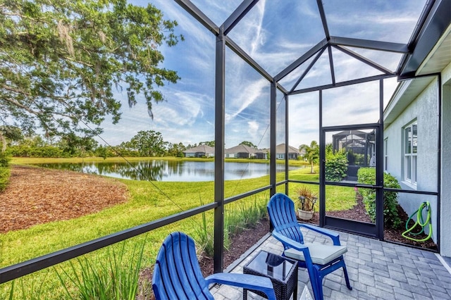 2628 Sapphire Blue Ln, Bradenton, FL 34211 - sunroom with a water view