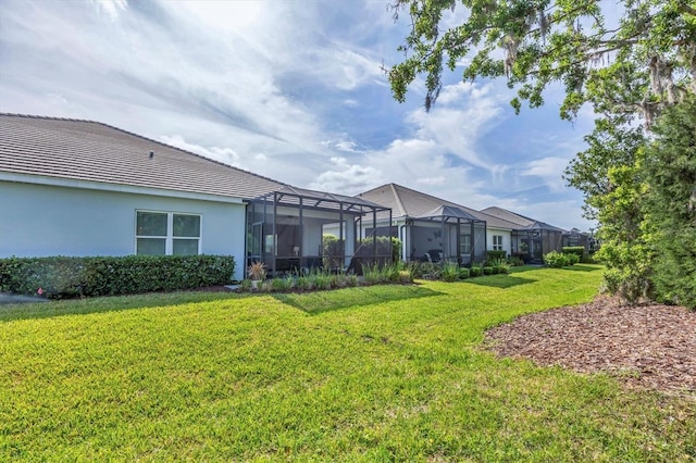2628 Sapphire Blue Ln, Bradenton, FL 34211 - view of grassy yard with a lanai