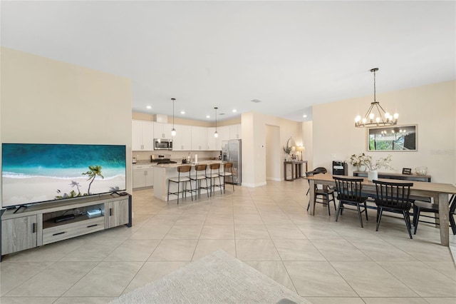 5406 Coral Reef Way, Lakewood Ranch, FL 34211 - living area with a chandelier, light tile patterned floors, and recessed lighting