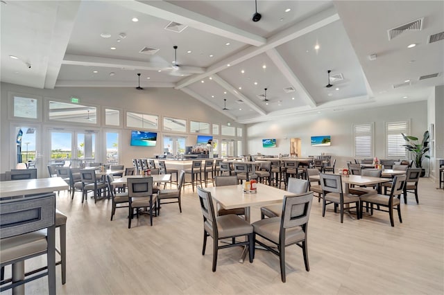 5406 Coral Reef Way, Lakewood Ranch, FL 34211 - dining area featuring high vaulted ceiling, beamed ceiling, healthy amount of natural light, light wood-style flooring, and recessed lighting