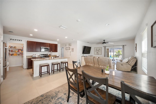 dining area with a ceiling fan, recessed lighting, and visible vents
