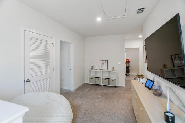 bedroom with light colored carpet, visible vents, baseboards, and recessed lighting