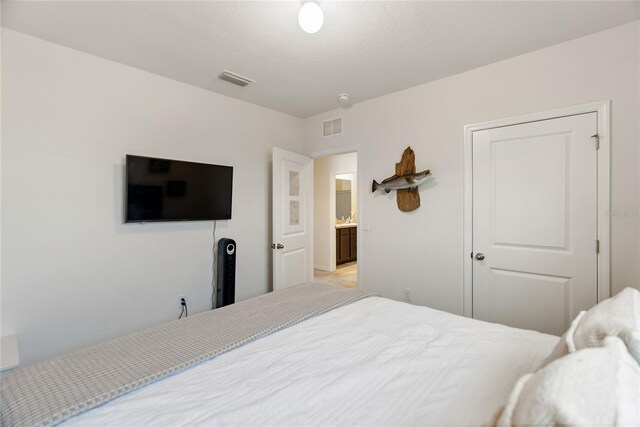 bedroom with visible vents