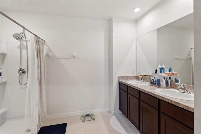 full bathroom featuring double vanity, a sink, tile patterned flooring, and a shower with shower curtain