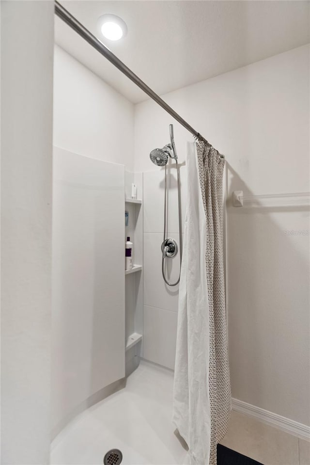full bath featuring a stall shower
