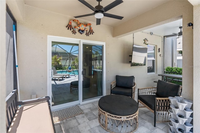 view of patio / terrace featuring ceiling fan