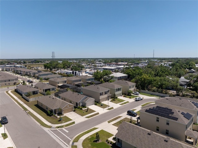 birds eye view of property with a residential view