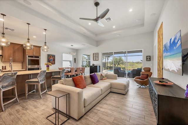 17675 Azul Dr, Lakewood Ranch, FL 34202 - living room with recessed lighting, visible vents, light wood-type flooring, and ceiling fan