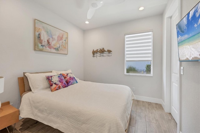 17675 Azul Dr, Lakewood Ranch, FL 34202 - bedroom featuring recessed lighting, wood finished floors, and a ceiling fan