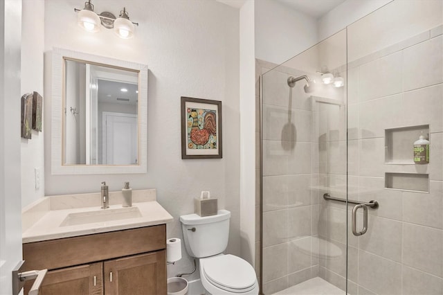 17675 Azul Dr, Lakewood Ranch, FL 34202 - bathroom with toilet, vanity, and a stall shower