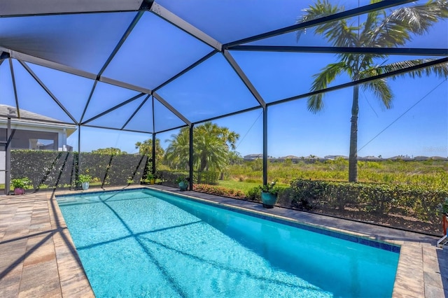 17675 Azul Dr, Lakewood Ranch, FL 34202 - pool featuring a patio and glass enclosure