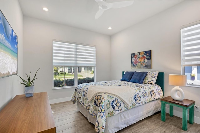17675 Azul Dr, Lakewood Ranch, FL 34202 - bedroom with recessed lighting, baseboards, a ceiling fan, and wood finished floors