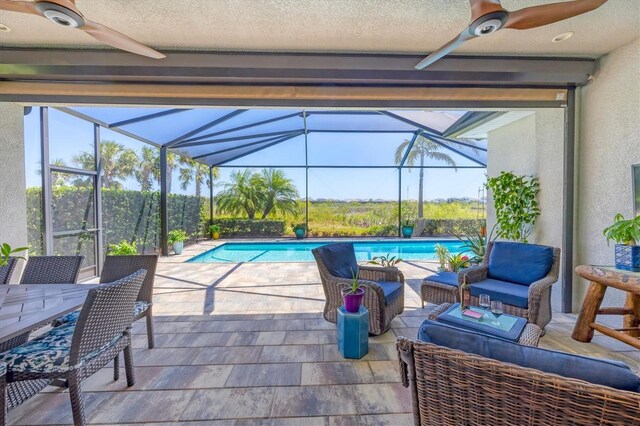 17675 Azul Dr, Lakewood Ranch, FL 34202 - view of patio with an outdoor pool, an outdoor living space, glass enclosure, and a ceiling fan