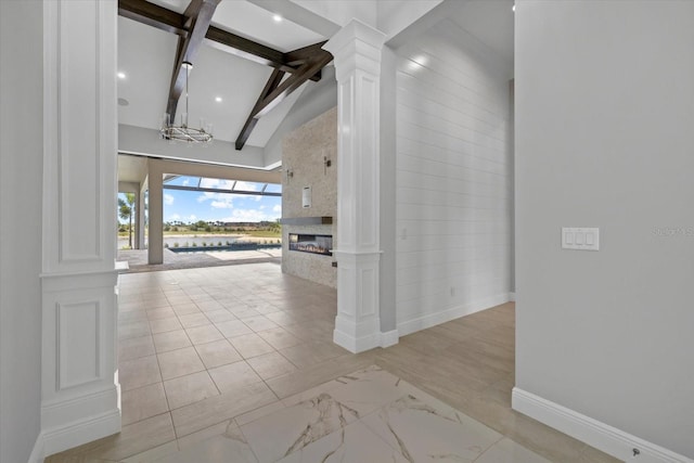 9241 Starry Night Ave, Sarasota, FL 34241 - corridor with recessed lighting, high vaulted ceiling, baseboards, marble finish floor, and beam ceiling