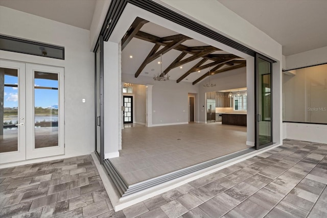 9241 Starry Night Ave, Sarasota, FL 34241 - view of patio with french doors and a water view