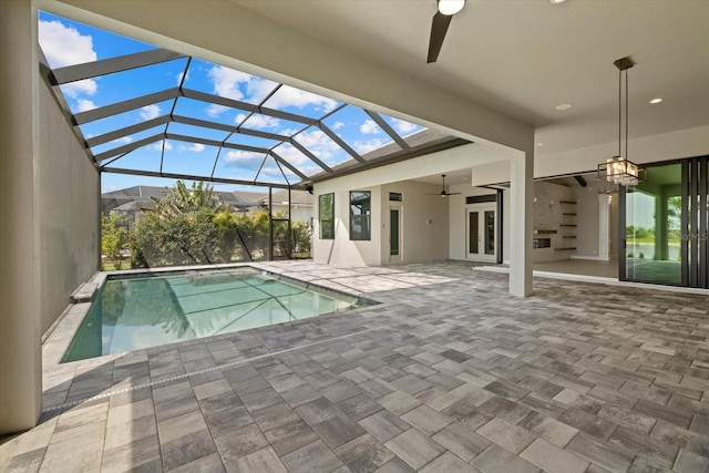 9241 Starry Night Ave, Sarasota, FL 34241 - outdoor pool with a lanai, ceiling fan, french doors, and a patio