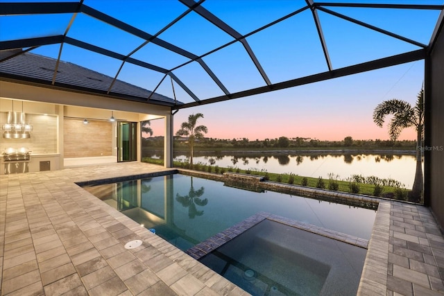 9241 Starry Night Ave, Sarasota, FL 34241 - view of pool with glass enclosure, an outdoor kitchen, and a patio area