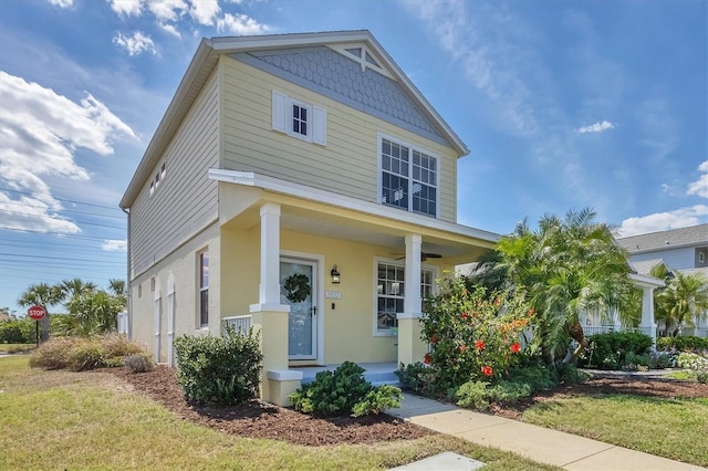 5532 River Sound Ter, Bradenton, FL 34208 - view of front of property with a porch, stucco siding, and a ceiling fan