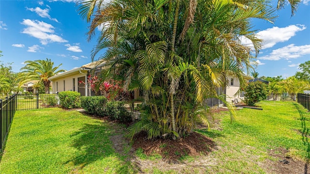 view of yard with a fenced backyard