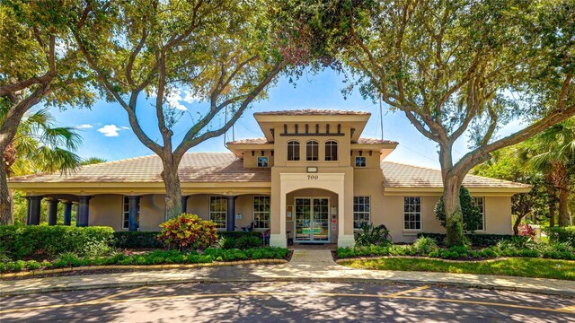 view of front of home featuring stucco siding