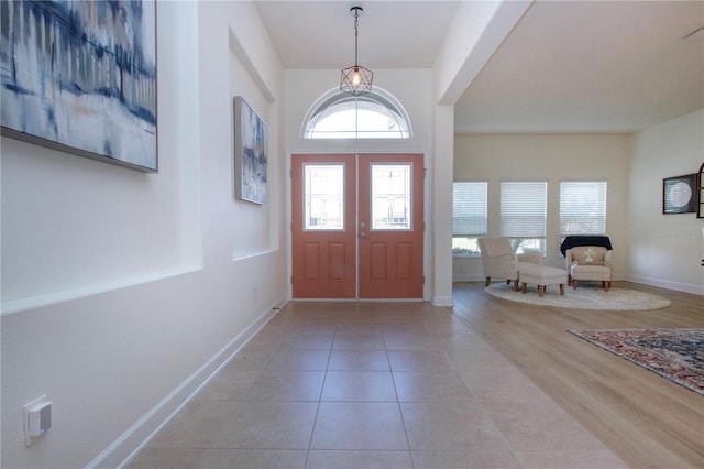 12841 Balsam Ter, Bradenton, FL 34212 - entryway featuring plenty of natural light, baseboards, and light tile patterned floors