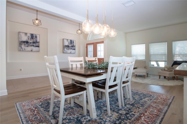 12841 Balsam Ter, Bradenton, FL 34212 - dining area featuring wood finished floors and baseboards