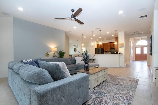 12841 Balsam Ter, Bradenton, FL 34212 - living room featuring light tile patterned floors, ceiling fan, baseboards, and recessed lighting