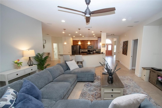 12841 Balsam Ter, Bradenton, FL 34212 - living room featuring recessed lighting, a ceiling fan, and light tile patterned floors