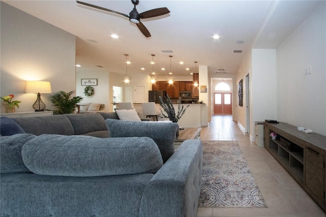 12841 Balsam Ter, Bradenton, FL 34212 - living area with light tile patterned floors, ceiling fan, and recessed lighting