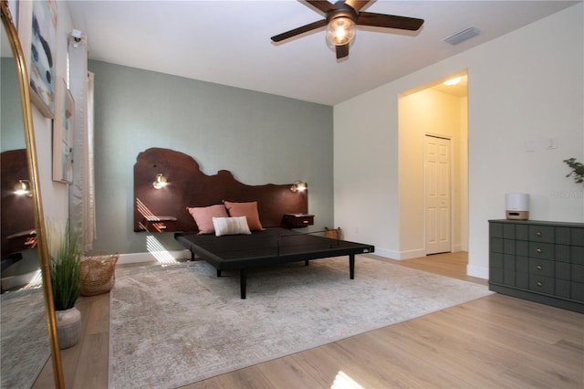 12841 Balsam Ter, Bradenton, FL 34212 - bedroom with wood finished floors, baseboards, and ceiling fan