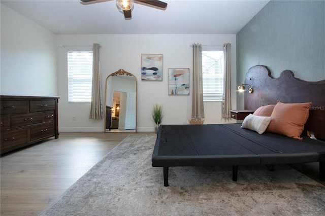 12841 Balsam Ter, Bradenton, FL 34212 - bedroom featuring light wood-type flooring, baseboards, and a ceiling fan
