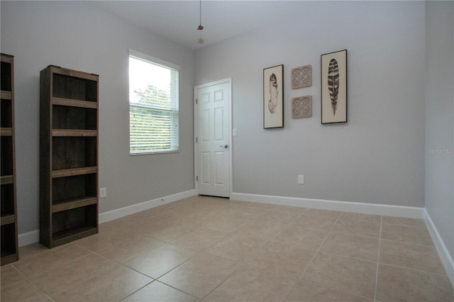 12841 Balsam Ter, Bradenton, FL 34212 - unfurnished room with light tile patterned flooring and baseboards