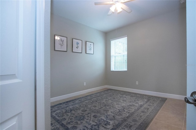 12841 Balsam Ter, Bradenton, FL 34212 - tiled empty room with a ceiling fan and baseboards
