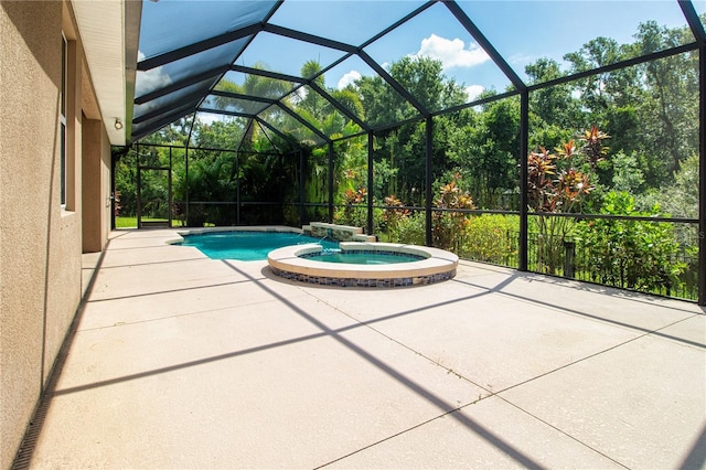 12841 Balsam Ter, Bradenton, FL 34212 - view of pool with a pool with connected hot tub, a patio, and glass enclosure