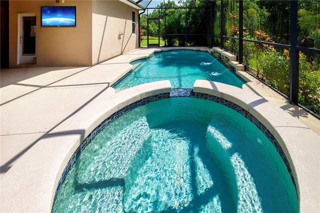 12841 Balsam Ter, Bradenton, FL 34212 - view of swimming pool with a patio area, glass enclosure, and a pool with connected hot tub